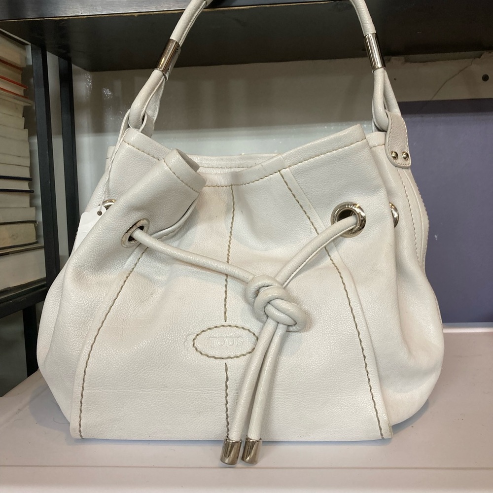 Todd’s white leather draw string tote